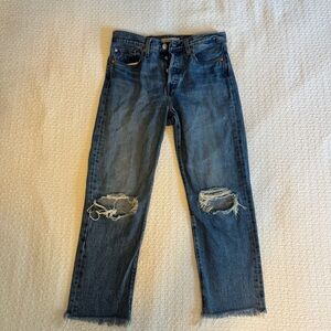 Levi's Women's Blue Cropped Jeans with Distressed Knees - Size 28